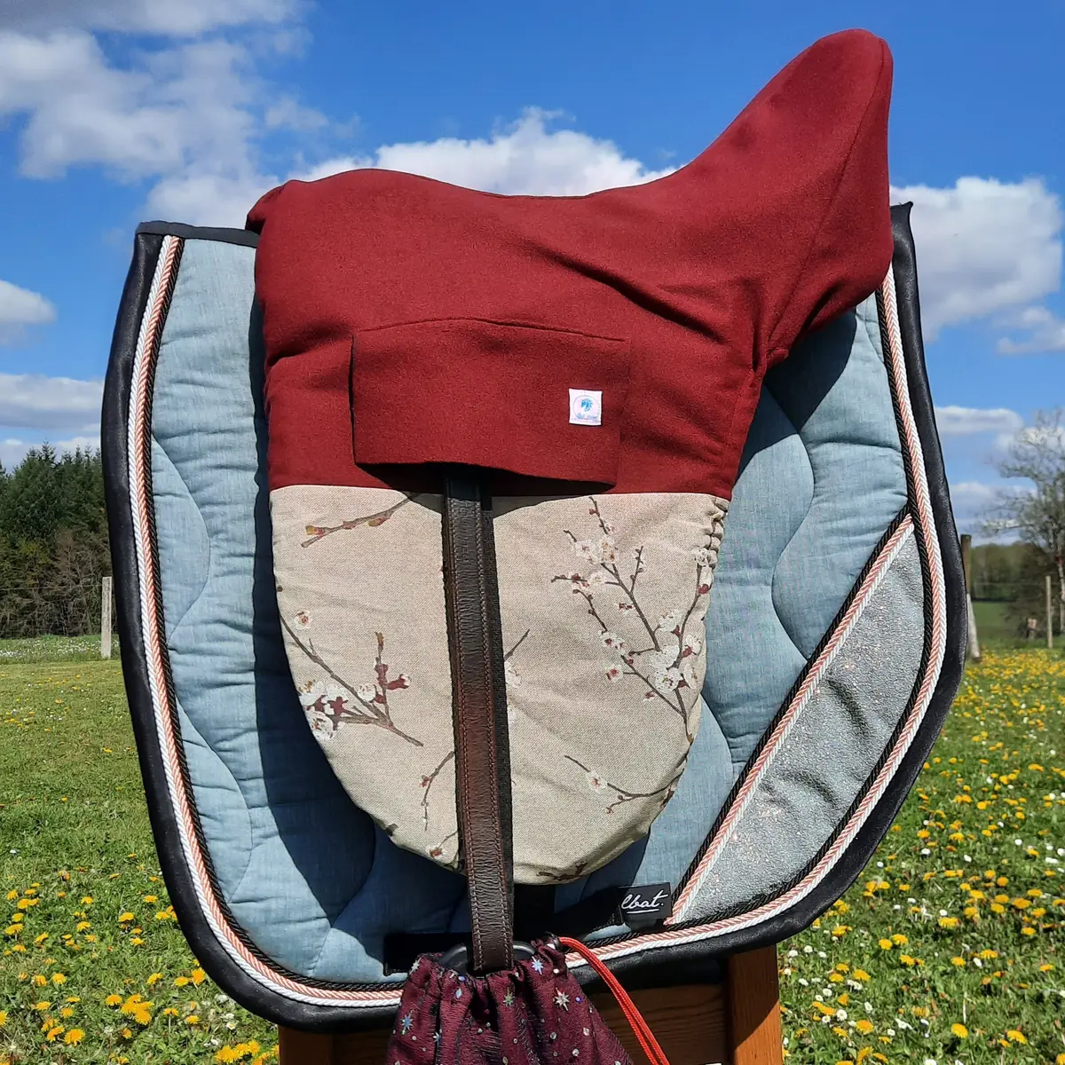 Couvre selle bi-colore bordeaux cerises
