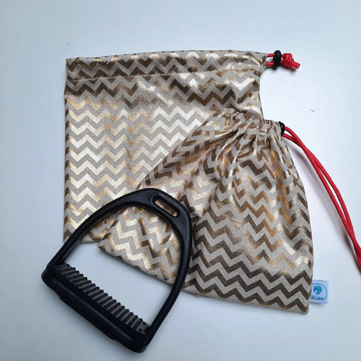 Gold zig-zag stirrup bags/covers