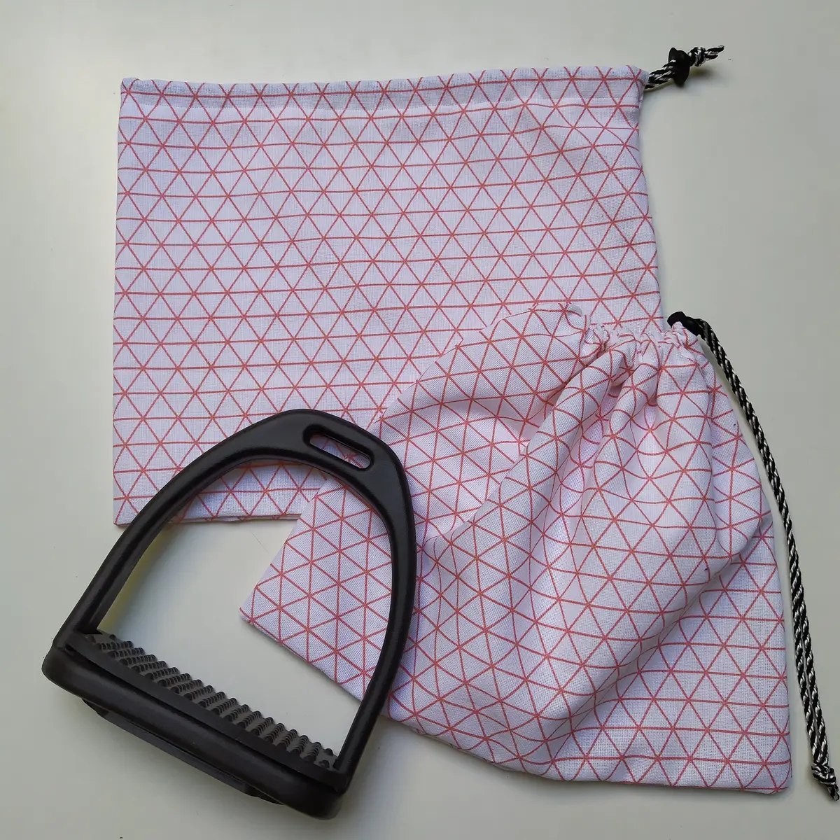 Geometric pink and white stirrup bags/covers