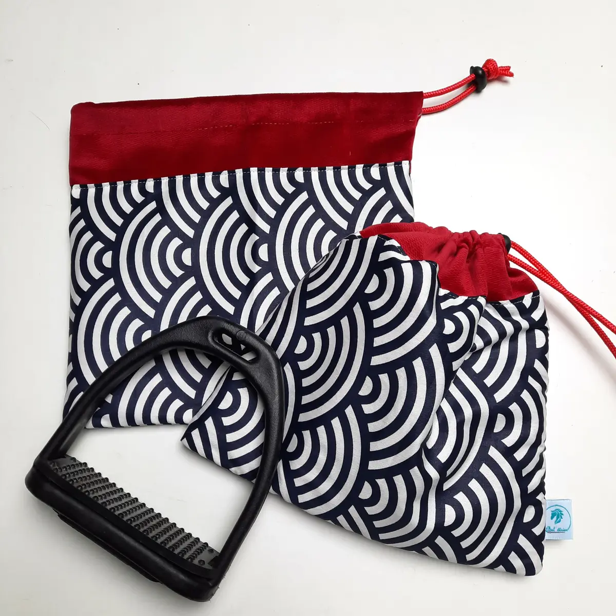 Oriental blue, white and red stirrup bags/covers