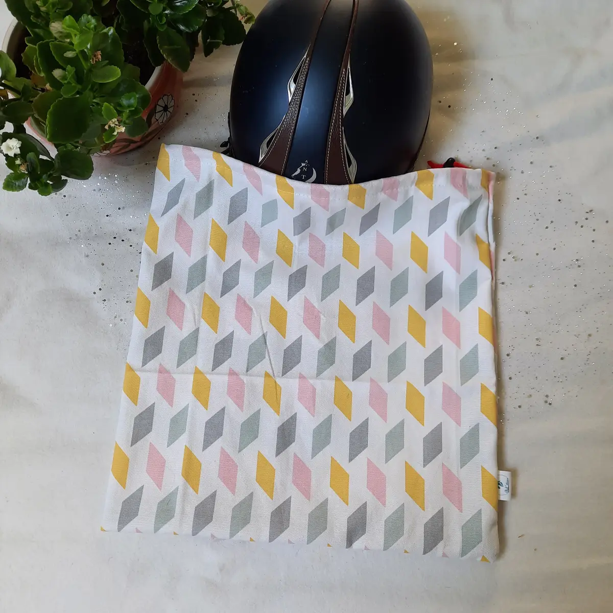 Pink, yellow and grey geometric helmet bag