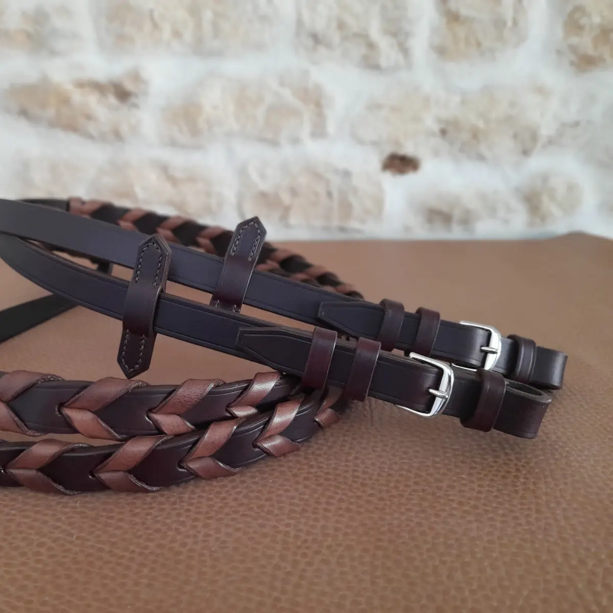 Pair of dark brown plaited reins