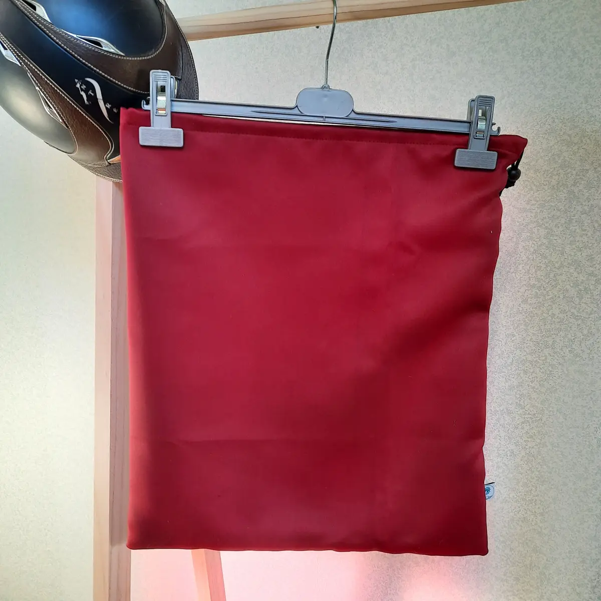 Plain burgundy helmet bag
