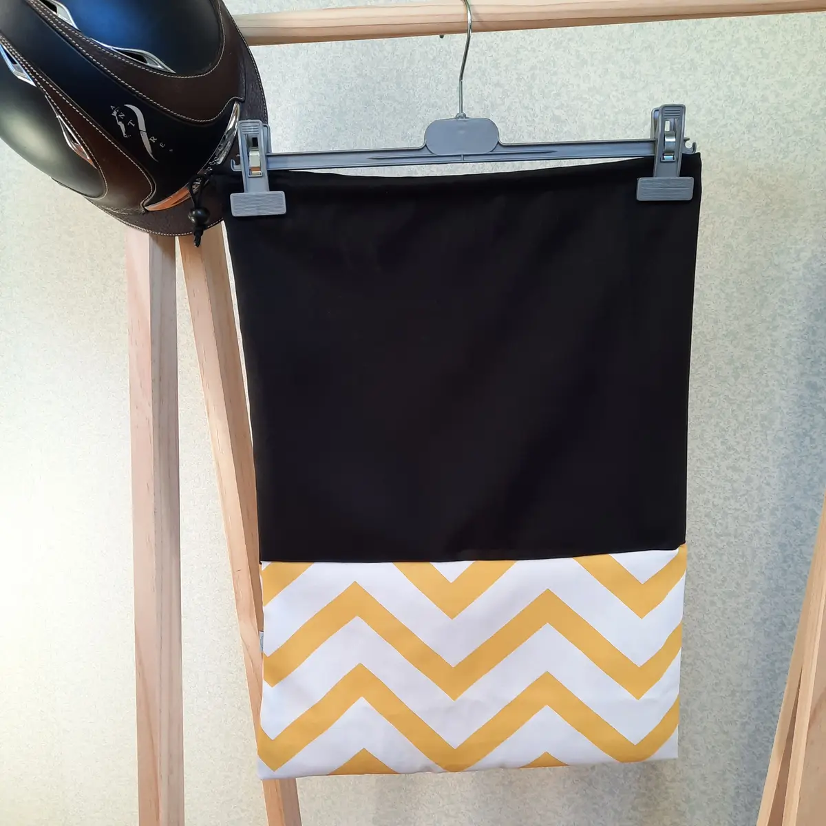 Two-tone black and yellow zig-zag helmet bag