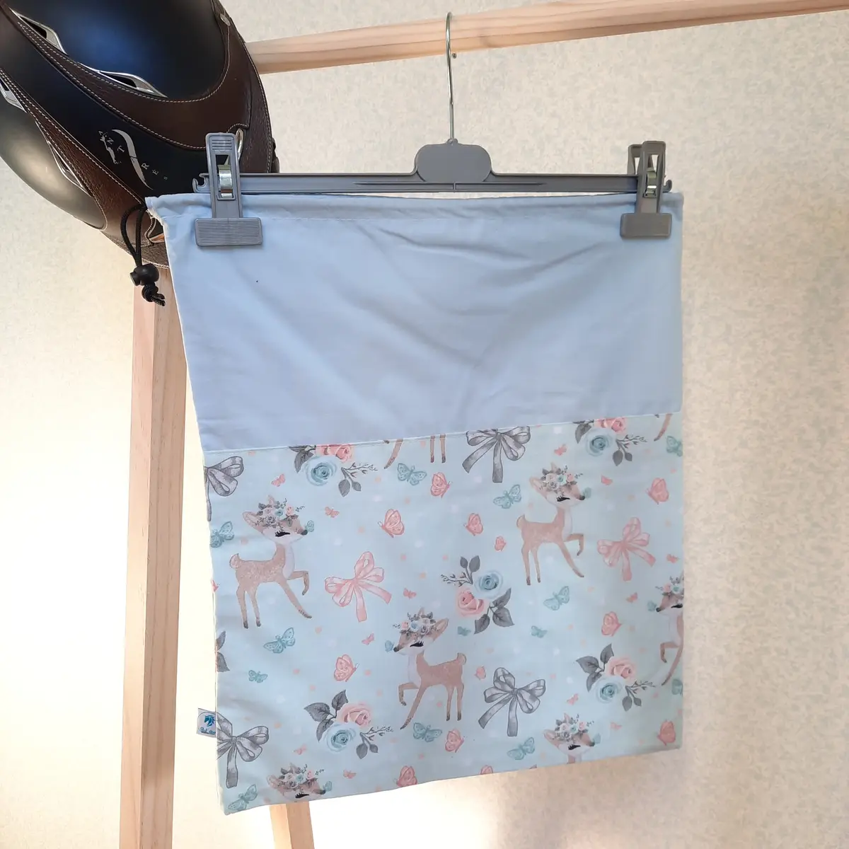 Two-tone sky blue and Bambi helmet bag
