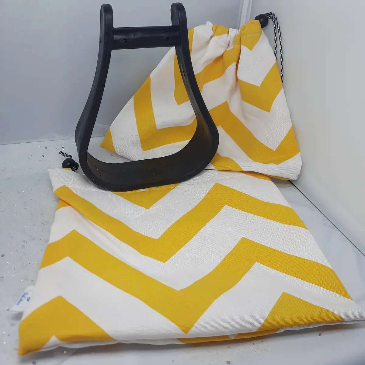 Yellow zig-zag stirrup bags/covers