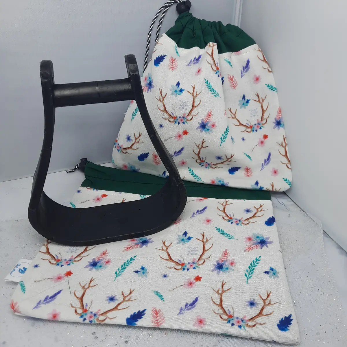 Two-tone green deer stirrup bags/covers