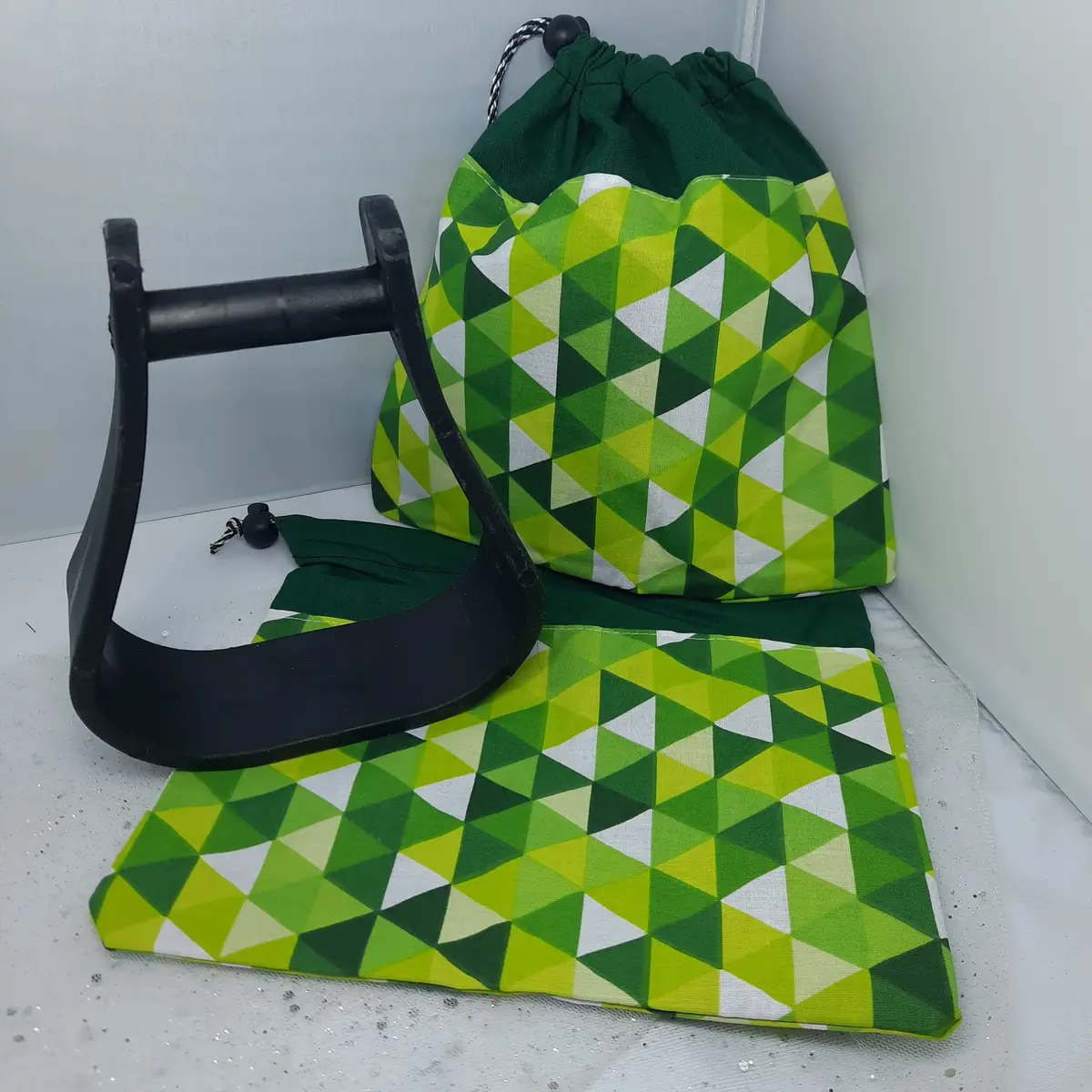 Two-tone green triangles stirrup bags/covers