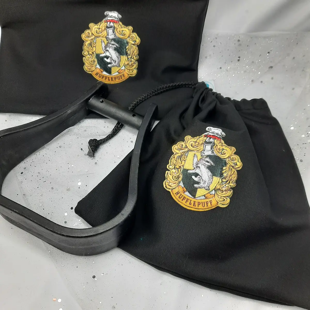 Black Hufflepuff stirrup bags/covers