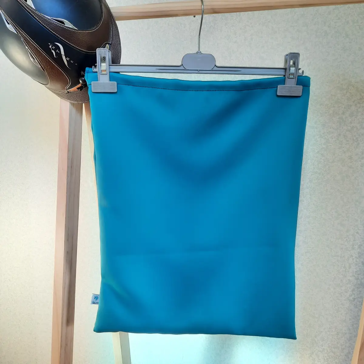 Plain turquoise helmet bag