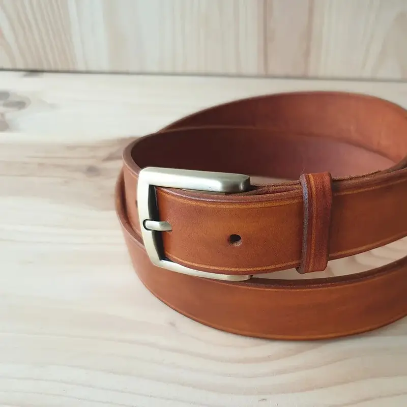 The "hand-sewn" belt