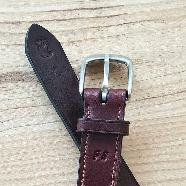The "hand-sewn" belt 2